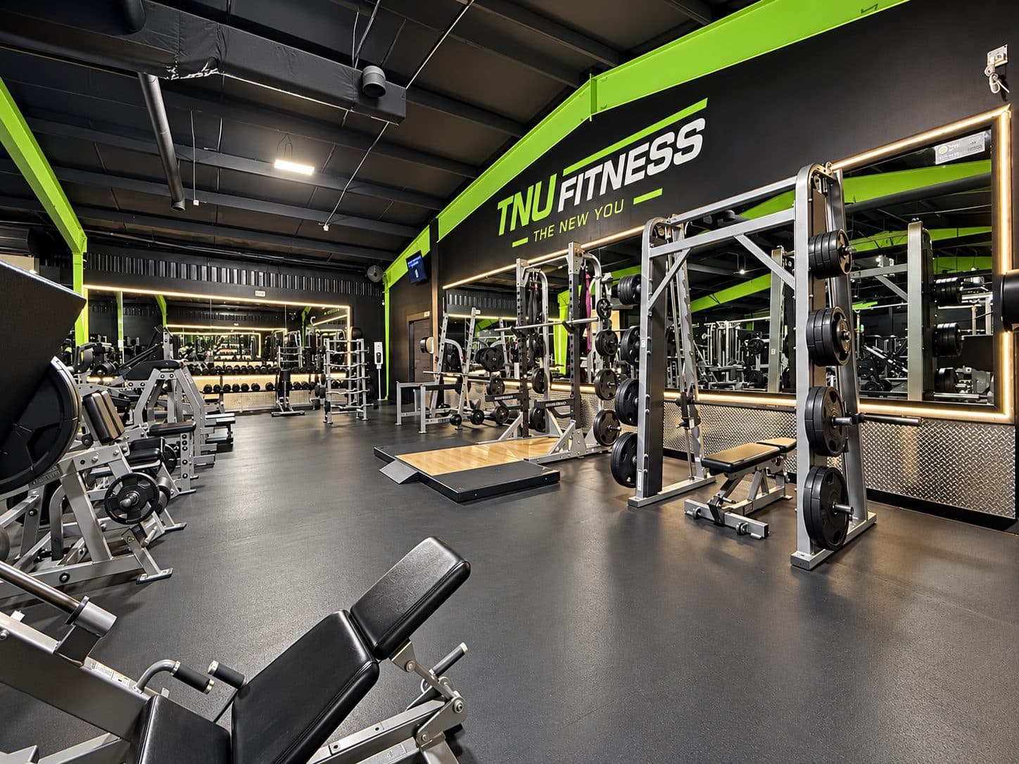 Adjustable benches and half racks at TNU Fitness