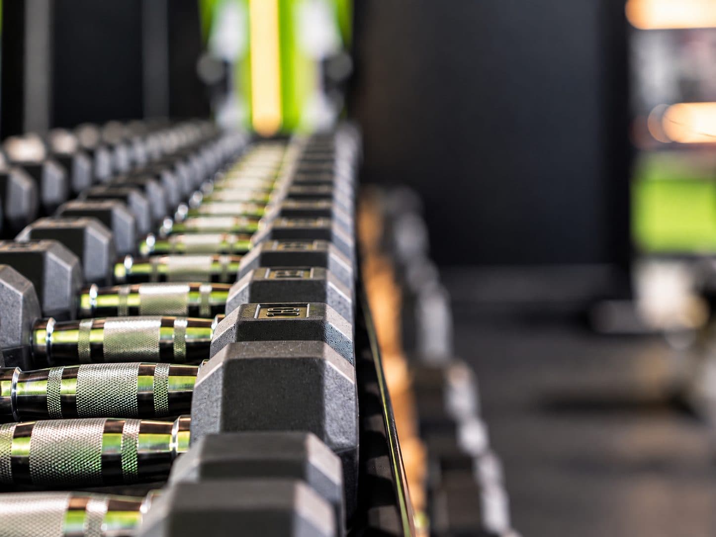 Close view of the dumbbell rack at TNU Fitness